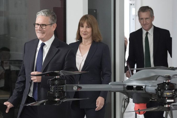Keir Starmer, Rachel Reeves, and Dan Jarvis discussing Defence Investment Plan funding at a press conference