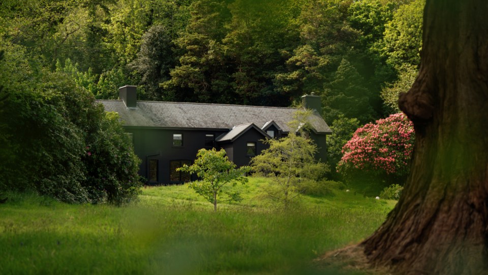 Ynyshir restaurant exterior showcasing modern architecture with lush greenery, captured by Joshua Greenwood