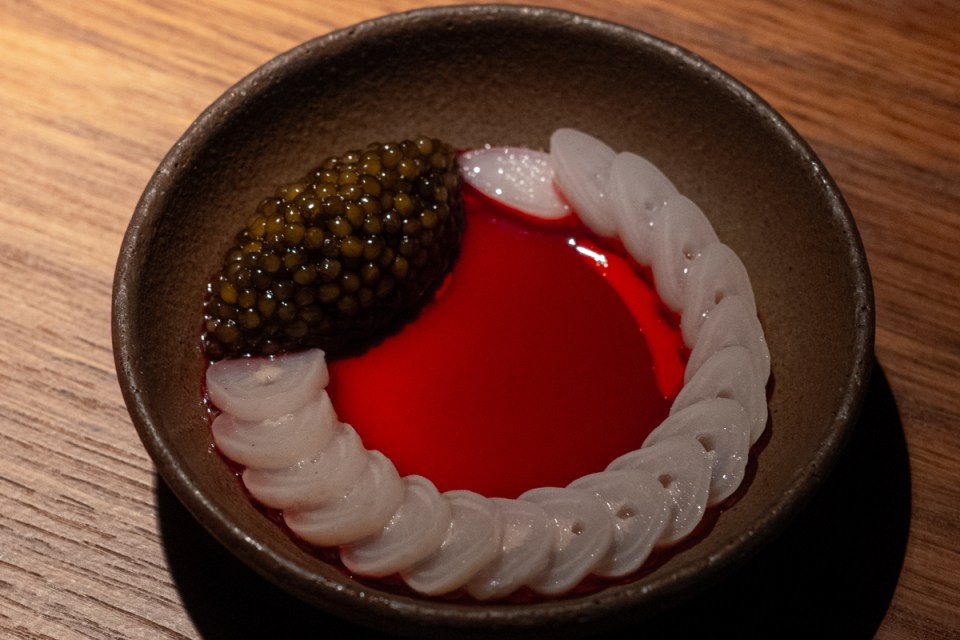 Ikoyi restaurants signature dish featuring vibrant, expertly plated contemporary West African cuisine with bold flavors