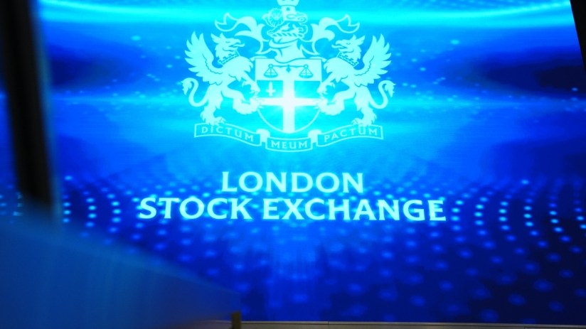 London Stock Exchange market activity with traders and financial charts, capturing economic trends and trading dynamics