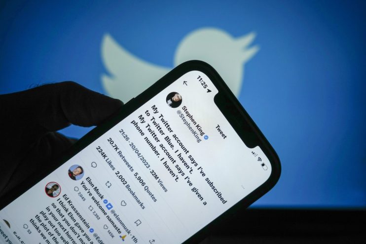 Twitter logo displayed on a digital screen, symbolizing its influential role in social media and online communication trends.