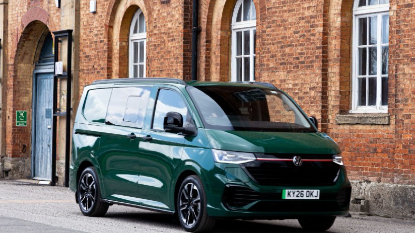 Volkswagen Transporter van parked on a city street, showcasing its sleek design and practical features for business use