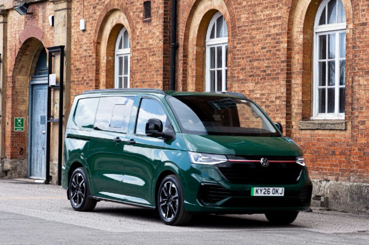 Volkswagen Transporter van parked on a city street, showcasing its sleek design and practical features for business use