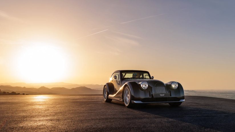 Morgan Midsummer Coupe, sleek design with classic curves, showcased in a modern setting, highlighting luxury and innovation