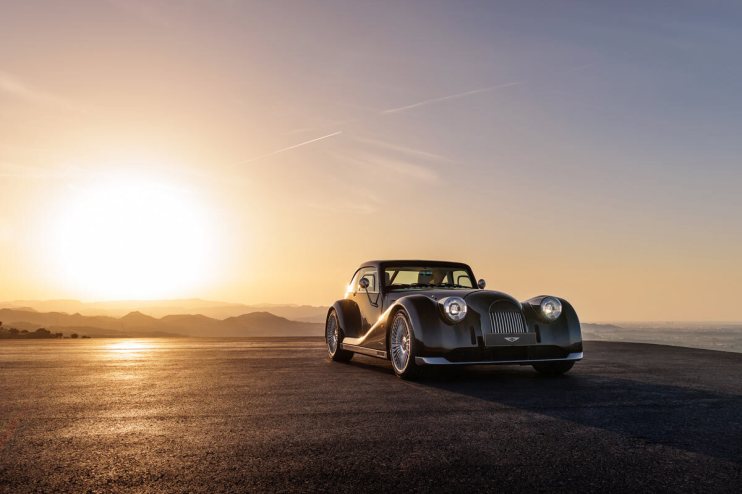 Morgan Midsummer Coupe, sleek design with classic curves, showcased in a modern setting, highlighting luxury and innovation