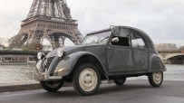 Vintage 1954 Citroen 2CV car on display showcasing classic French automotive design and innovation
