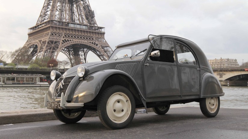 Vintage 1954 Citroen 2CV car on display showcasing classic French automotive design and innovation
