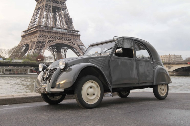 Vintage 1954 Citroen 2CV car on display showcasing classic French automotive design and innovation