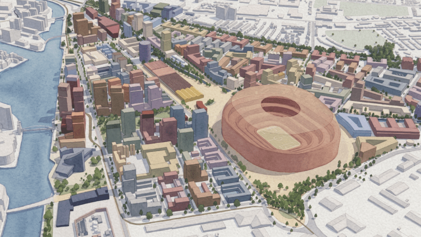 Architectural model of a city development featuring a large stadium, buildings, and waterways by Allies and Morrison