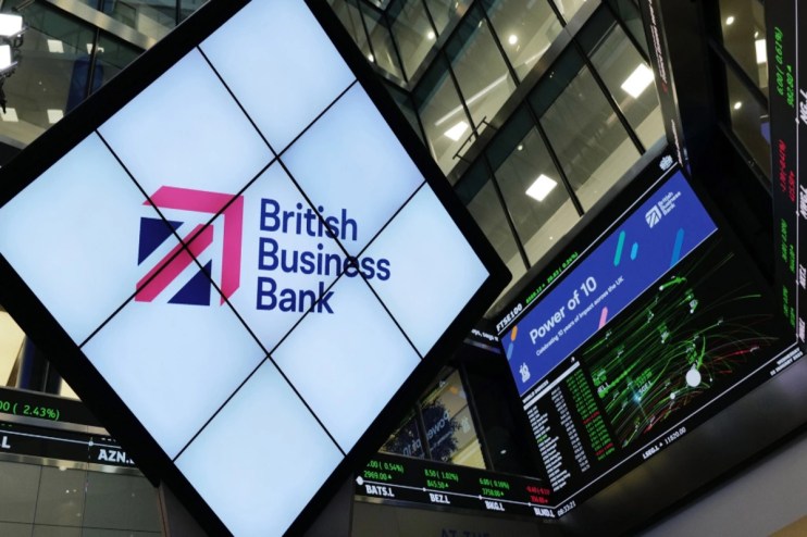 British Business Bank 10th anniversary celebration featuring executives, commemorative banners, and festive decor