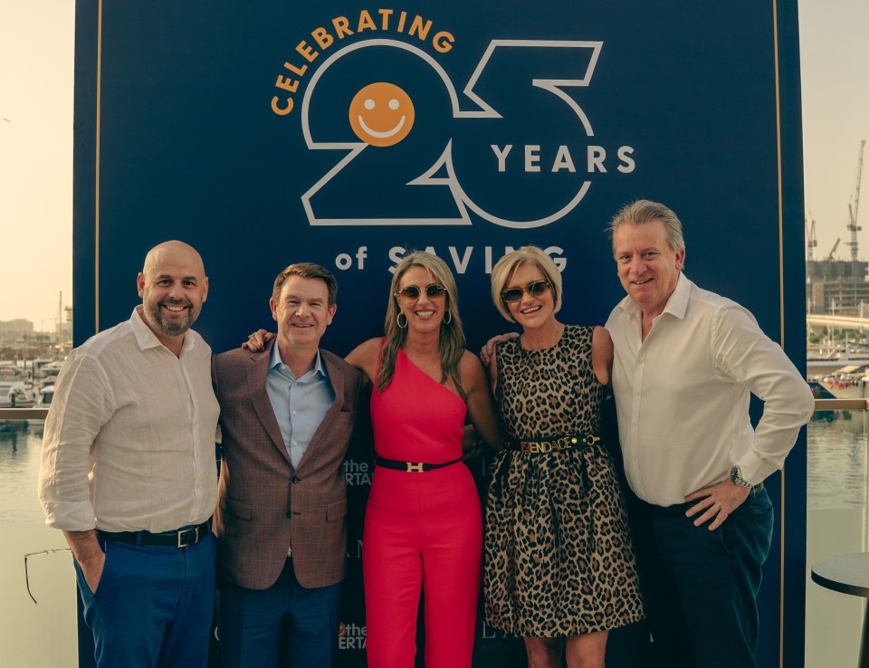 Donna celebrating 25th anniversary with first merchants, showcasing milestone achievements and community partnerships.