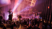 Guests enjoying vibrant Havana Sky Garden party with colorful decorations and lively atmosphere