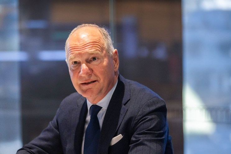 Heathrow CEO Thomas Woldbye in a suit and tie, speaking at an event, warning against a tax raid.