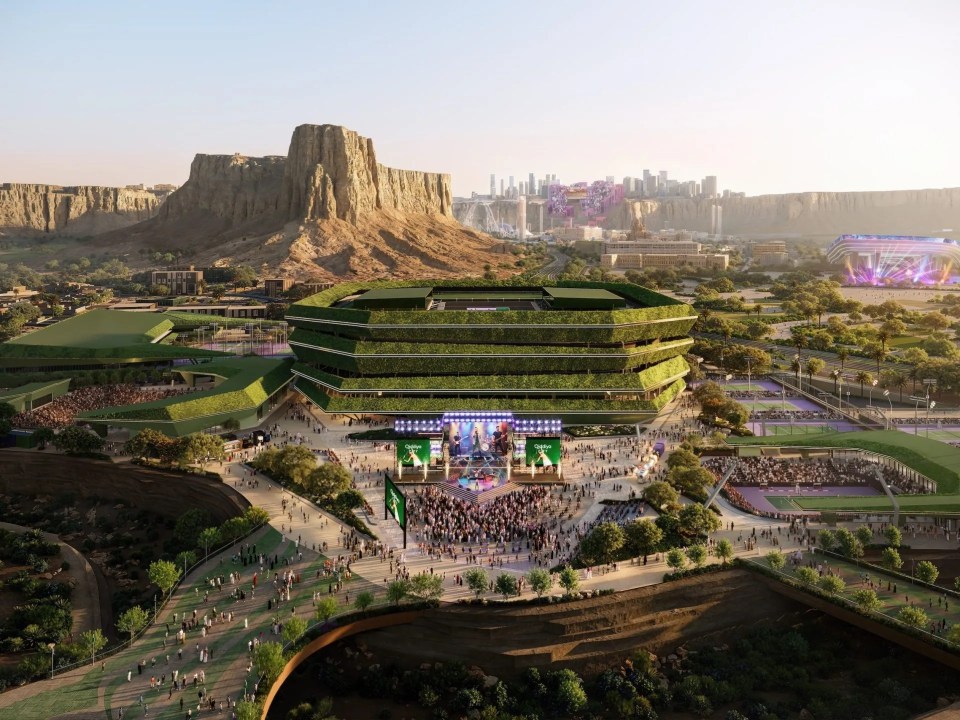 Aerial view of a futuristic National Tennis Centre with green roofs, a performance stage, and mountains in the background