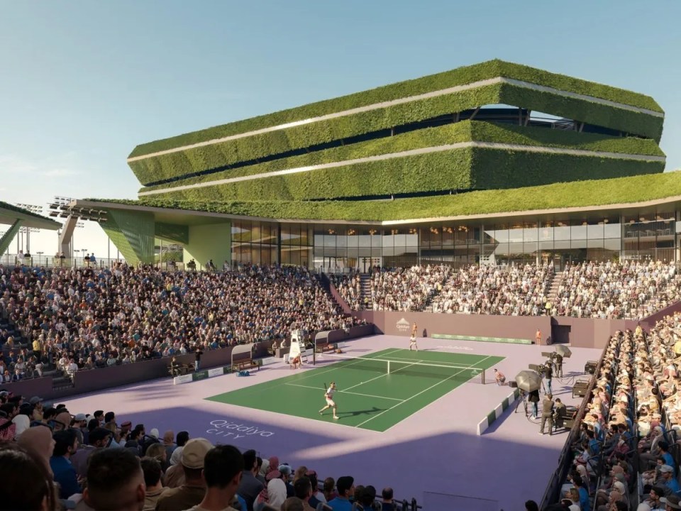 Qiddiya City National Tennis Centre with green roof, full stadium, and tennis players on court