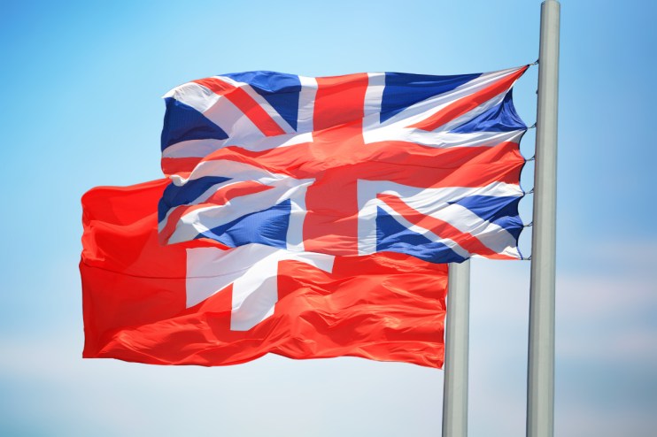 UK and Switzerland officials signing a trade deal, highlighting international services agreement and bilateral cooperation