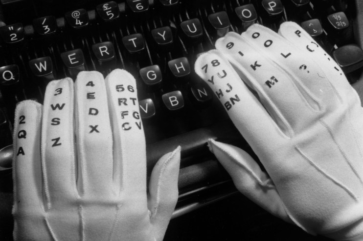 Vintage 1960s typing gloves, showcasing retro office fashion and ergonomic design for typewriter use