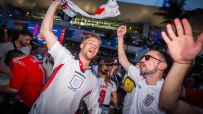 Exciting World Cup match action with players in dynamic play, showcasing international sportsmanship and competition