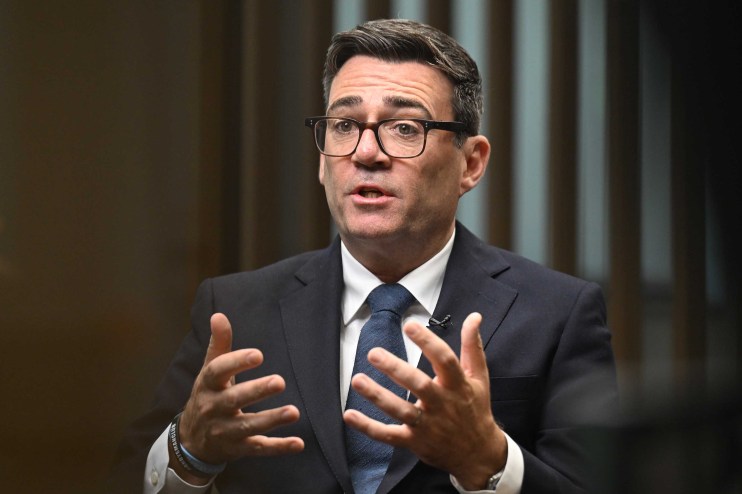 Andy Burnham, Mayor of Greater Manchester, speaking and gesturing during an interview