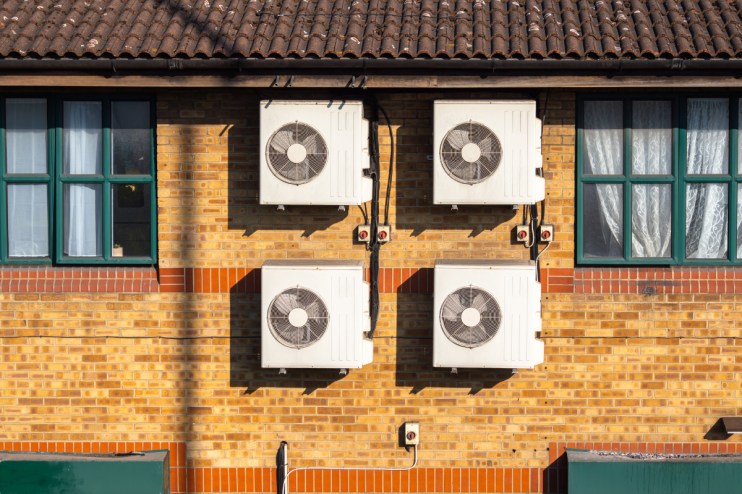 Air conditioning vents in a grid pattern, illustrating cooling solutions during a heatwave