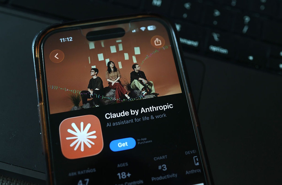 Smartphone displaying the Claude by Anthropic AI assistant app, showing the app icon and interface.