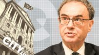 Andrew Bailey, Governor of the Bank of England, with the Bank of England building and Union Jack flag in the background