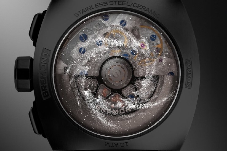 Bremont Stephen Hawking watch case back with visible movement and swirling celestial dust effect