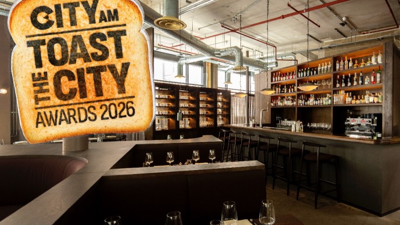 CITY AM Toast the City Awards 2026 logo superimposed over an upscale bar and restaurant interior.