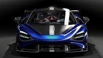 McLaren supercar on display, showcasing sleek design and advanced engineering against a backdrop of a bustling automotive ...