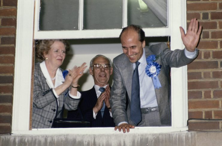 Norman Tebbit and Margaret Thatcher discussing political strategy at a conference, highlighting Conservative leadership dy...