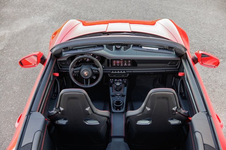 Sleek Porsche 911 GT3 showcased in dynamic urban setting, highlighting its performance features and modern design