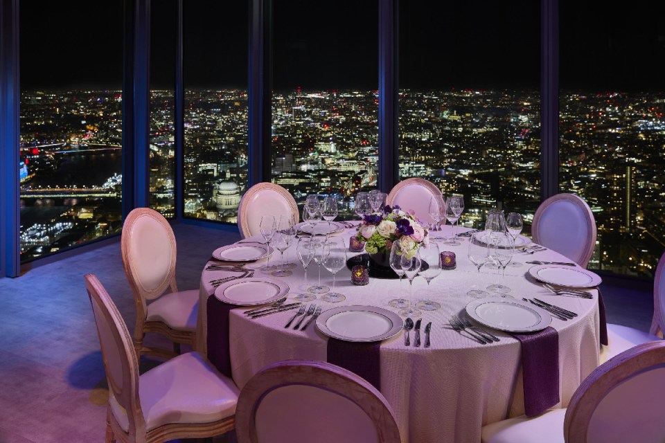 Searcys Horizon 22 elegant interior with panoramic views, showcasing modern decor and ambient lighting in a business setting