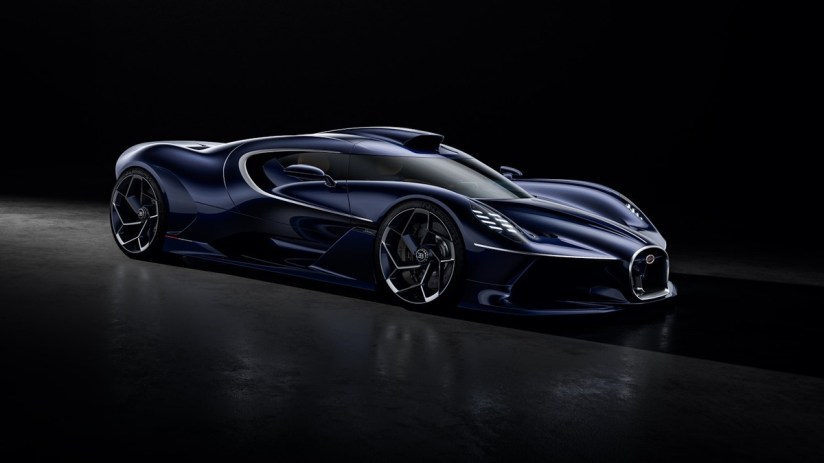 Dark blue Bugatti Solitaire Destrier hypercar with sleek design and silver trim, against a black background