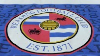 Reading Football Club crest on a blue and white banner, with EST. 1871 visible.