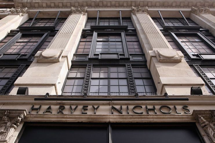 Exterior view of the Harvey Nichols department store building facade with detailed windows and architectural columns