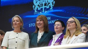 Julia Hoggett and Rachel Reeves with other women leaders at a financial event, discussing pension industry overhaul.