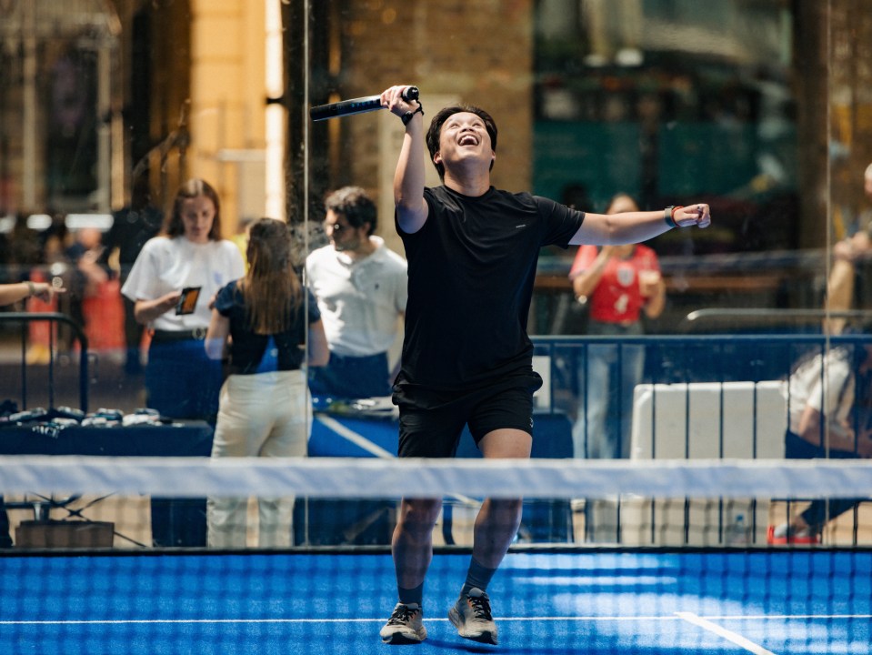 Excited man celebrating during a padel match at the London sports festival on London Bridge City