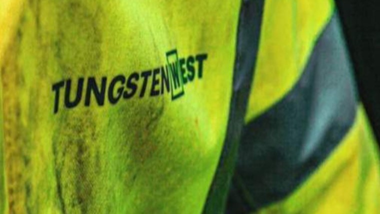Tungsten West logo on a neon yellow high-visibility jacket with reflective stripes, suggesting mining or industrial work.