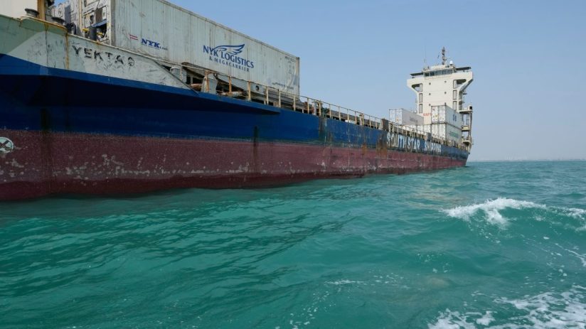 Large cargo ship YEKTA S with NYK Logistics containers on turquoise water, SOUTH STAR SHIPPING visible.