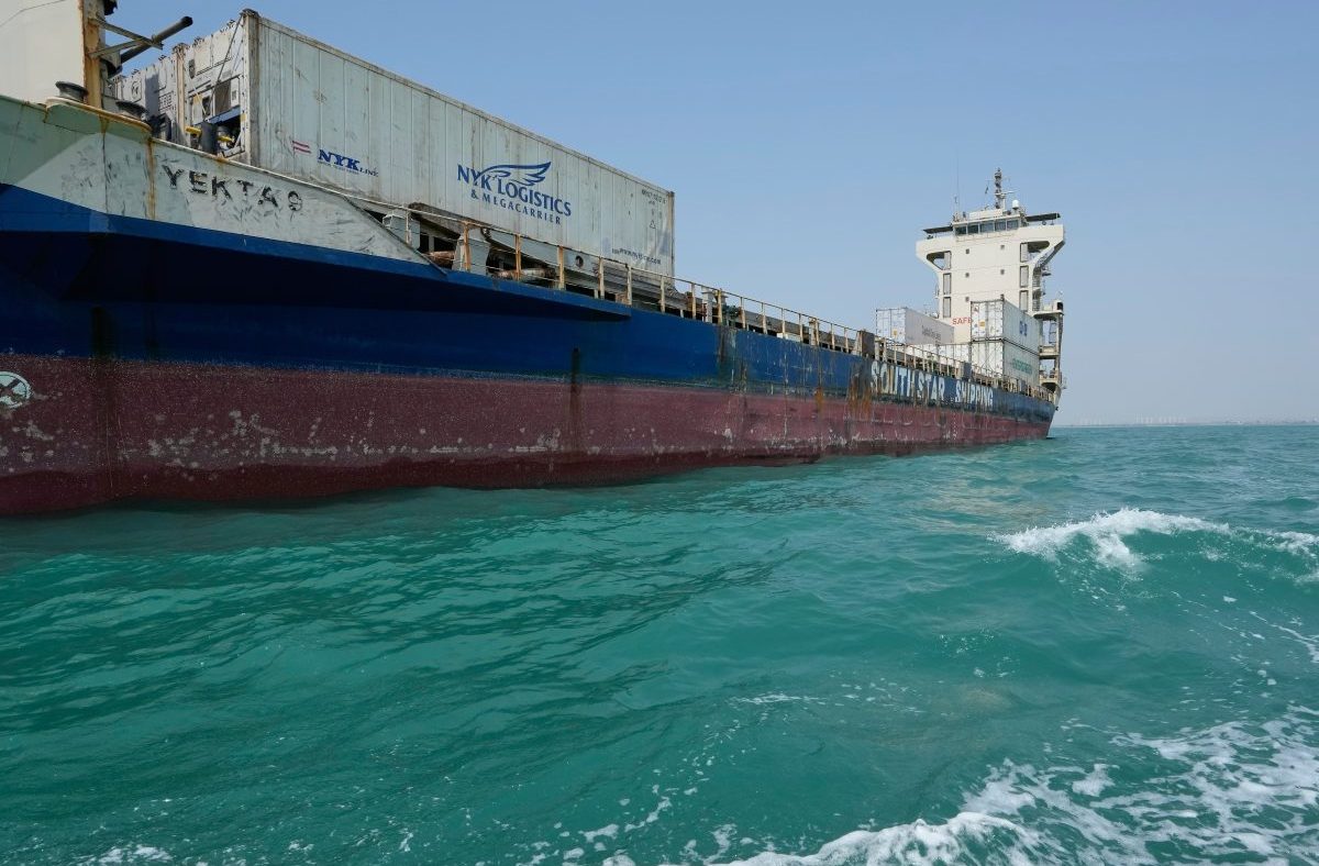 Large cargo ship YEKTA S with NYK Logistics containers on turquoise water, SOUTH STAR SHIPPING visible.