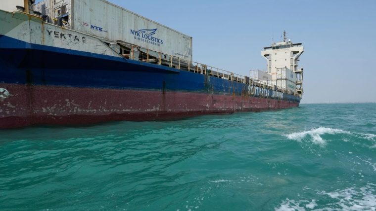 Large cargo ship YEKTA S with NYK Logistics containers on turquoise water, SOUTH STAR SHIPPING visible.