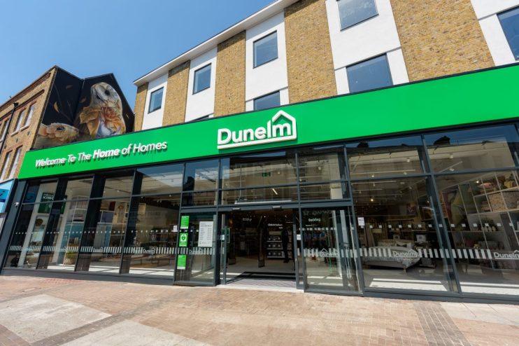 Exterior of the new Dunelm Kingston superstore with a bright green facade and large glass windows.