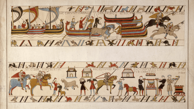 Detailed section of the Bayeux Tapestry showing soldiers, horses, ships, and daily life scenes.
