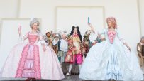 Performers in elaborate 18th-century costumes for As You Like It at Shakespeares Globe, Marc Brenner photo.