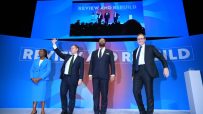 Kemi Badenoch, Tom Tugendhat, James Cleverly, and a Conservative MP on stage during a reshuffle event.