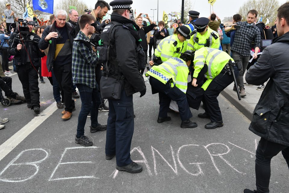 Climate Change Protesters Block Key Bridges And Intersections