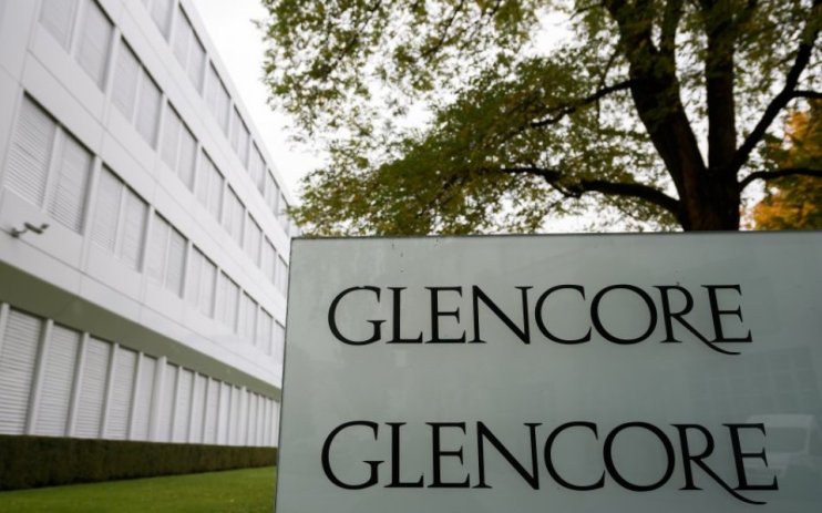 Glencore has reported a drop in profit and reduced shareholder returns following the "normalisation of international energy flows."